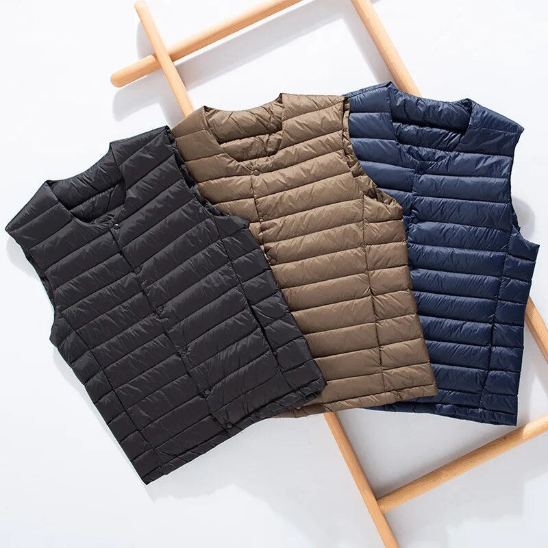 Men's ultralight down vest, a versatile layering piece for warmth and freedom of movement.