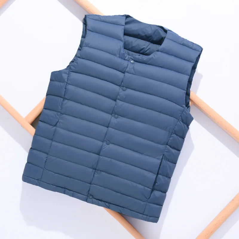 Stylish men's ultralight vest, a modern layering piece for dynamic outdoor and city adventures.