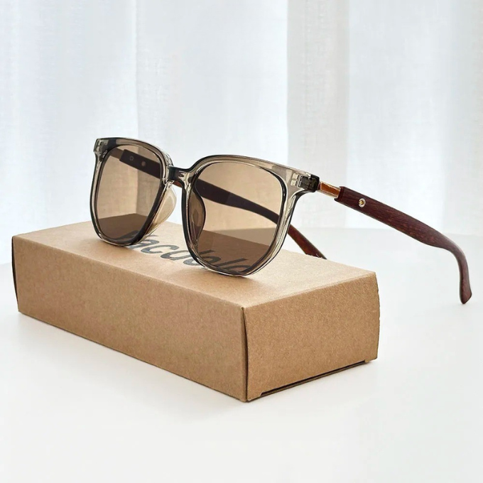 Fashionable unisex sunglasses featuring a unique acetate and wood frame, providing UV protection.