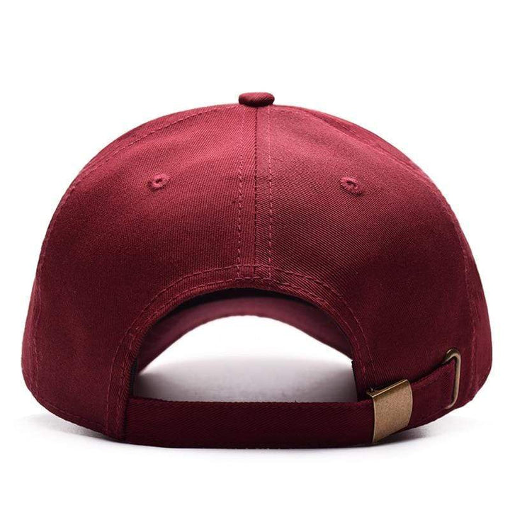 Model wearing a unisex adjustable baseball cap, perfect for sun protection and everyday wear
