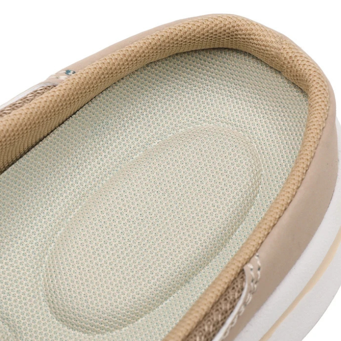 Grey unisex backless slip-on comfort sneaker slides, a versatile and easy-to-wear footwear option.