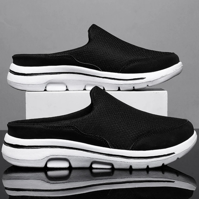 Front view of unisex backless slip-on comfort sneaker slides, highlighting the relaxed fit.