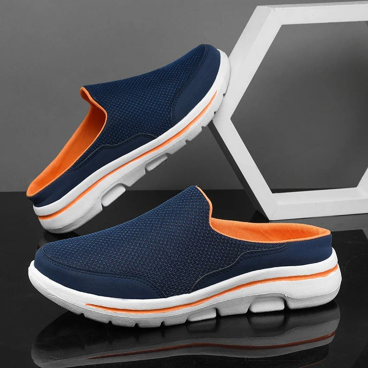 Detail of the sole pattern on a comfort backless slip-on sneaker slide for improved traction.
