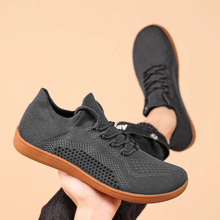 Lightweight Barefoot Knit Athletic Sneakers on a white background, flexible sole