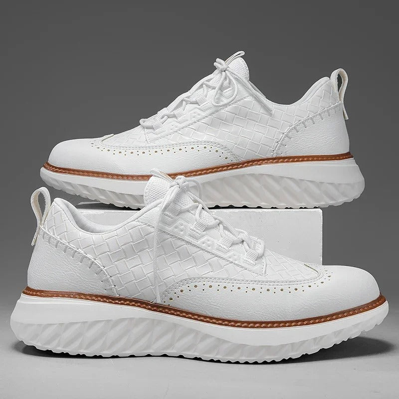 White unisex running shoes, offering support and breathability for active lifestyles.