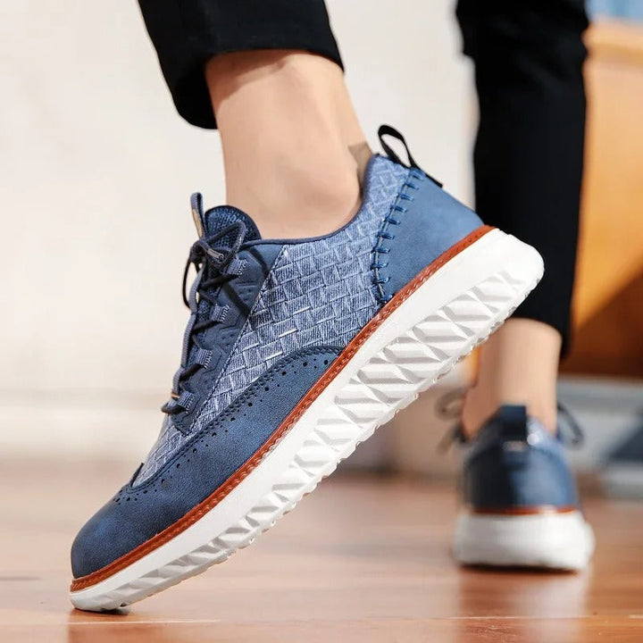 Three pairs of unisex athletic sneakers: black, white, and blue, for versatile comfort.