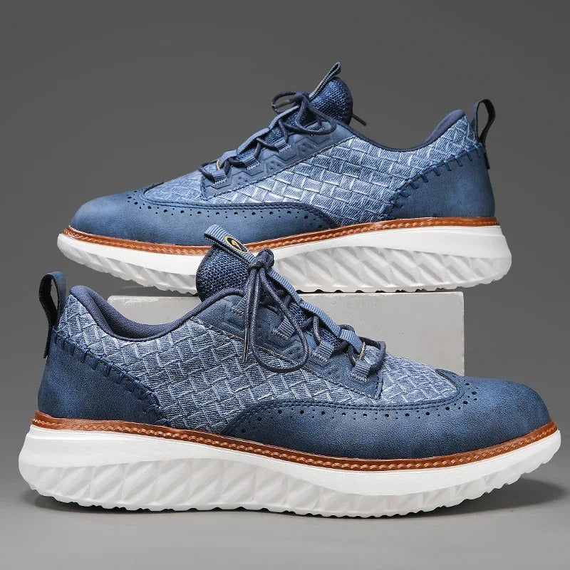 Close-up of the breathable upper on a white unisex comfort sneaker, daily wear.