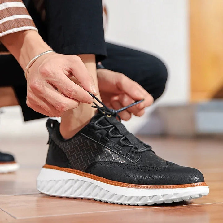 Blue unisex athletic sneakers, offering everyday comfort and support for various activities.