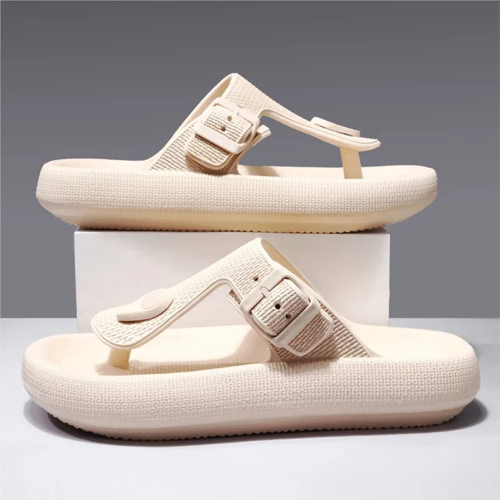 Pair of unisex grey cushioned slide sandals, top-down view, offering ultimate foot comfort.