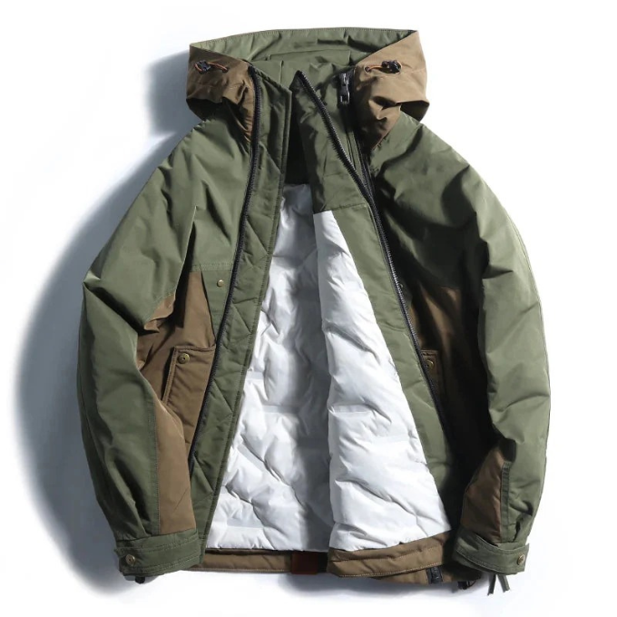 Close-up of the durable fabric on an insulated techwear utility jacket, ideal for winter