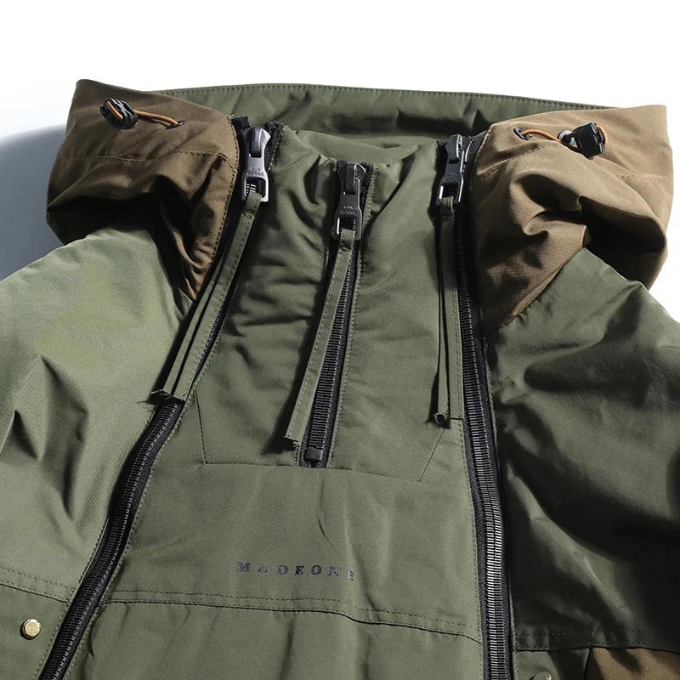 Model wearing an insulated techwear utility jacket, showcasing its modern fit and style