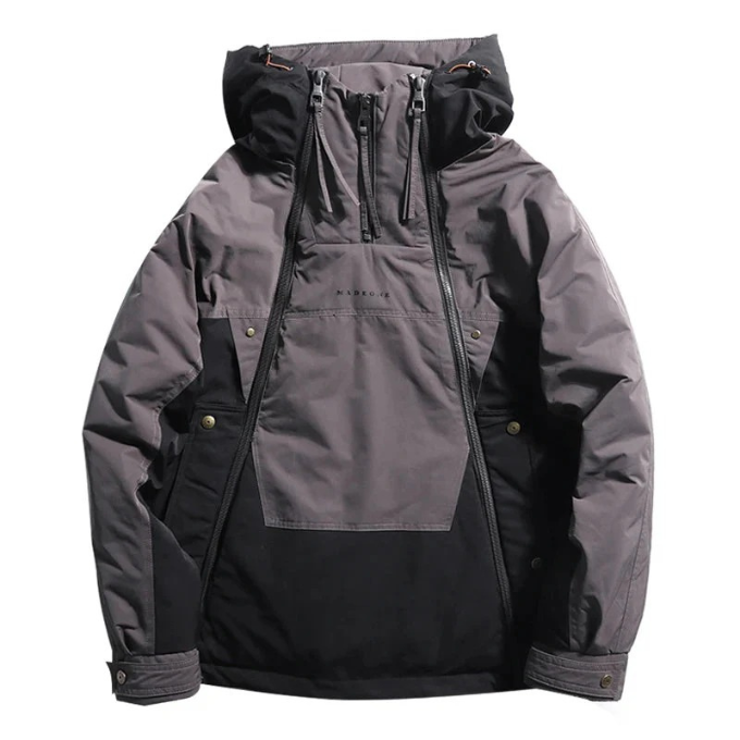 Lifestyle image of someone outdoors in an insulated techwear jacket, suitable for men & women