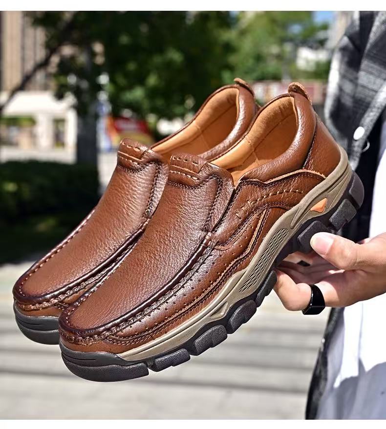 Pair of brown leather orthopedic transition boots with arch support, designed for pain relief and all-day comfort