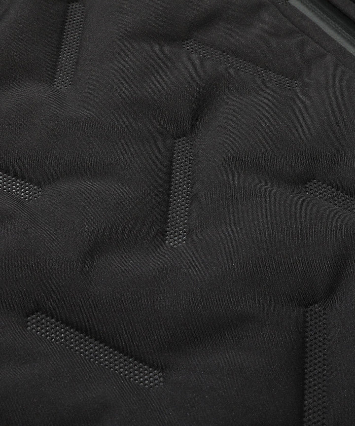 Unisex quilted puffer vest in a neutral beige, an essential piece for year-round casual warmth