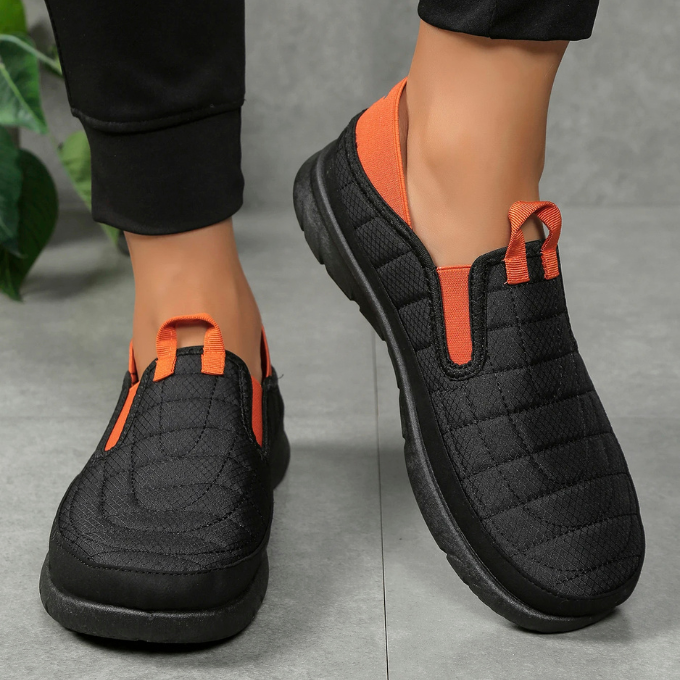Display of various colors of unisex slip-on comfort casual shoes, emphasizing choice and style