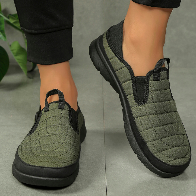 Close-up of a slip-on comfort casual shoe showing its quilted puffer texture and breathability