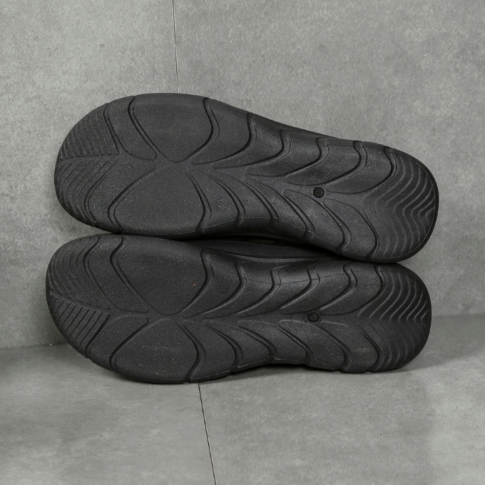 Unisex slip-on comfort casual shoes in a lifestyle setting, emphasizing their versatility for walkers
