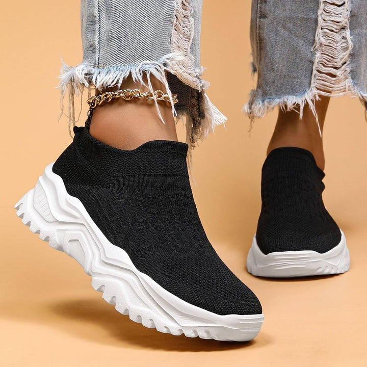 Pair of black & white unisex orthopedic slip-on shoes, excellent walking and comfort footwear