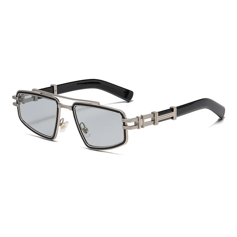 Detail of the metal frame on geometric sunglasses, emphasizing quality craftsmanship and modern design