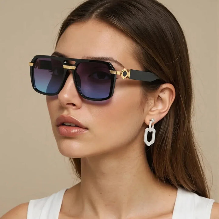 Trendy square frame fashion eyewear, these unisex sunglasses offer UV400 protection with a gradient lens.