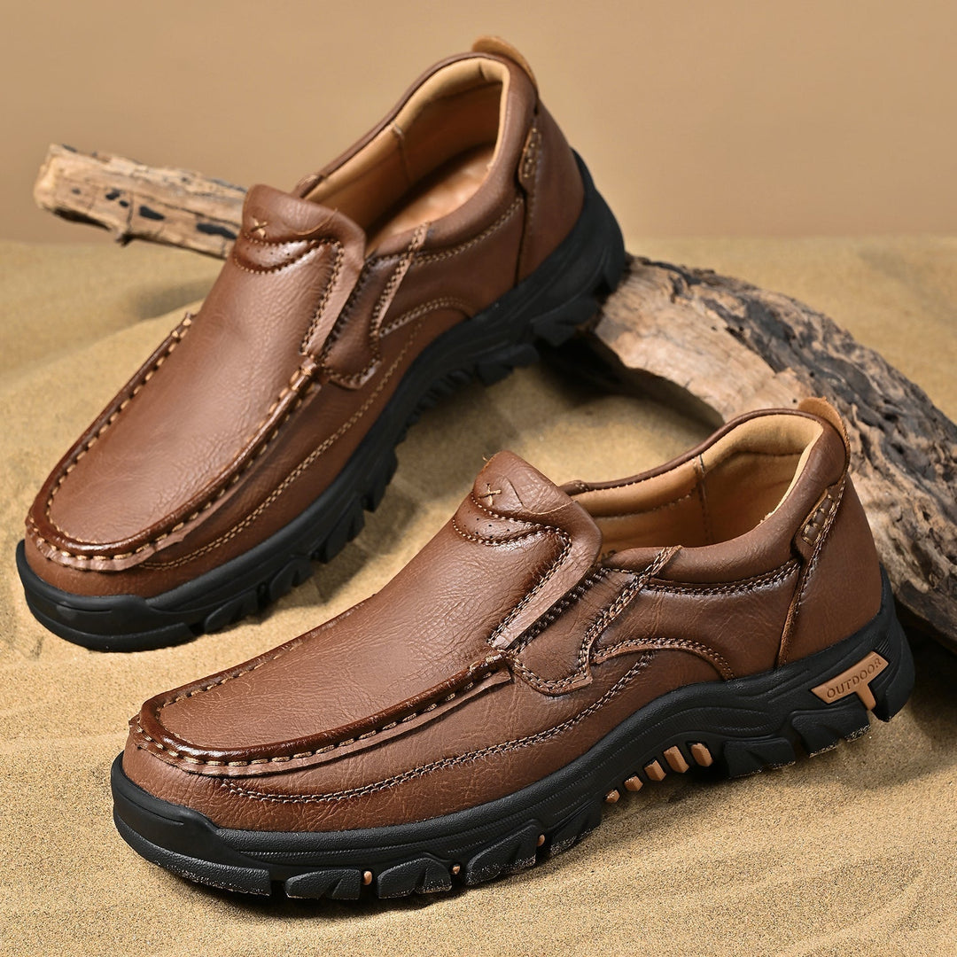 Pair of brown orthopedic comfort transition boots on a white background, ready for wear