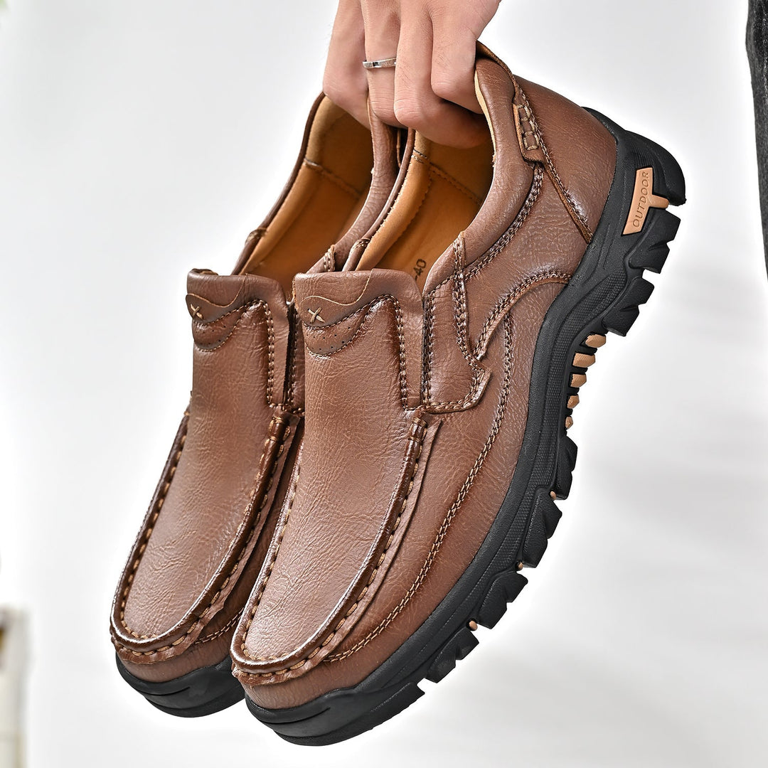 Pair of men's orthopedic comfort transition boots, brown leather, front view, casual footwear