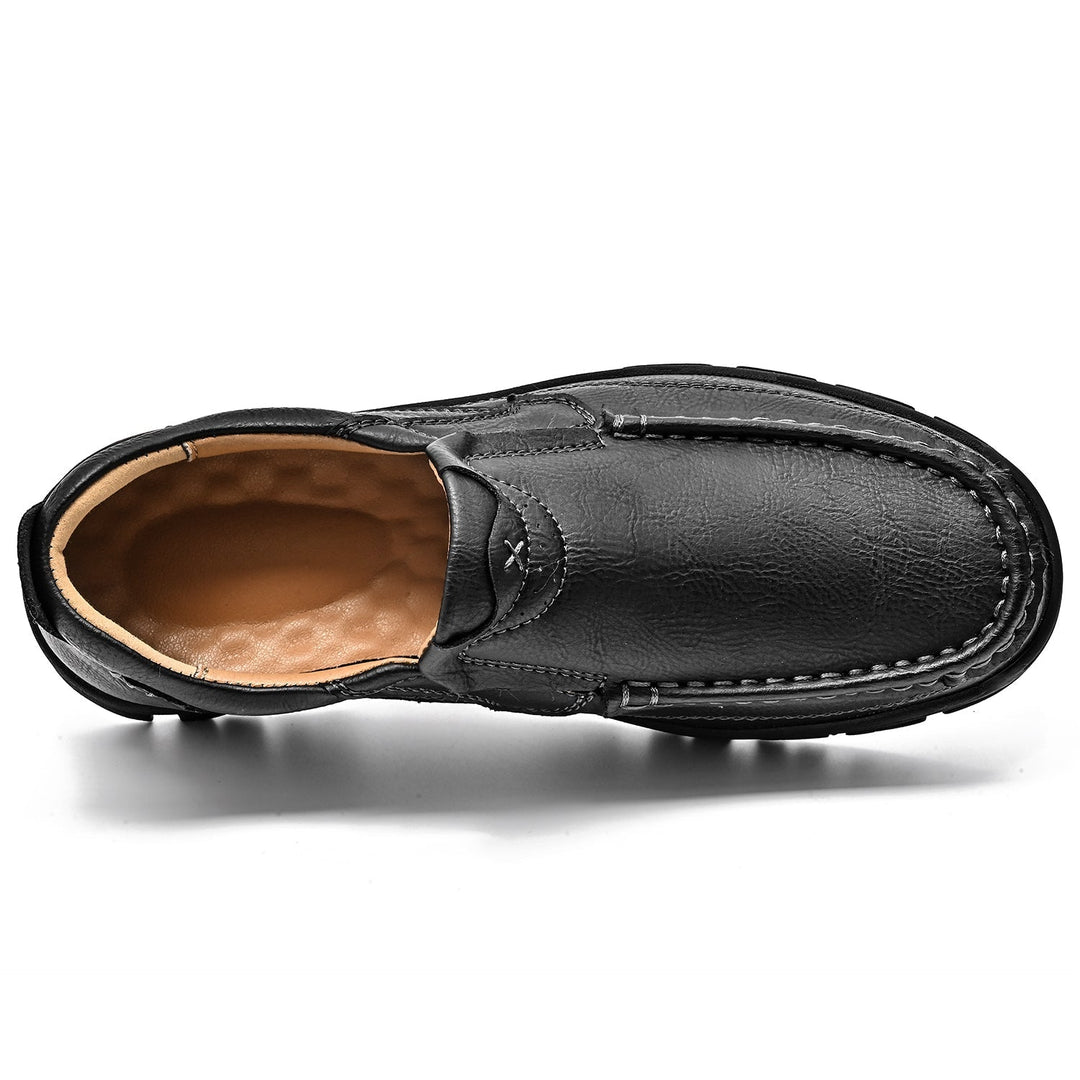 Close-up on the quality hardware of a brown orthopedic comfort transition boot, secure fit