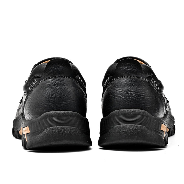 Mens brown orthopedic comfort boot with a robust sole, built for traction and durability