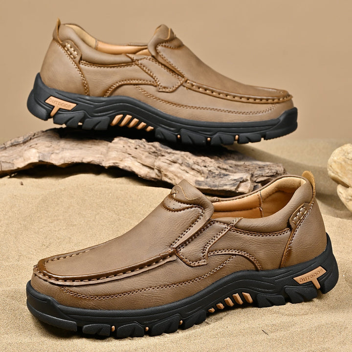 Pair of brown orthopedic comfort boots for men, elegant design with health benefits