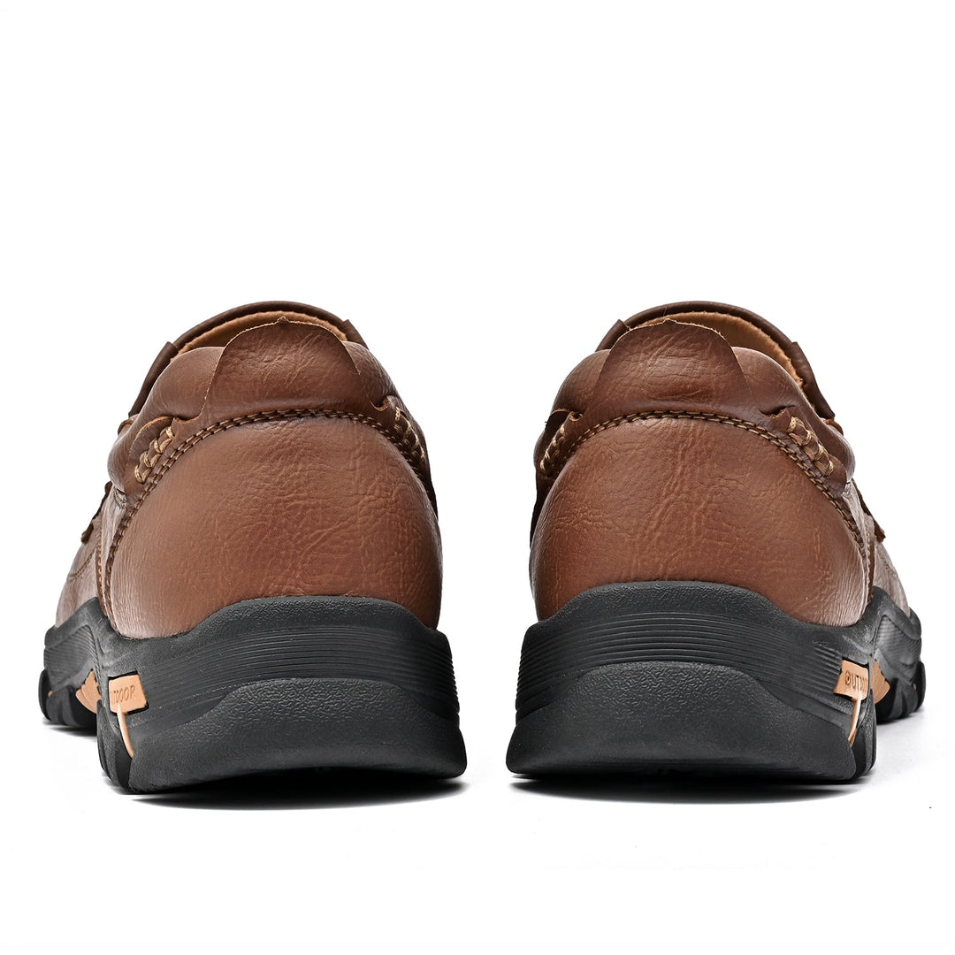 Detail of the slip-resistant sole on a brown unisex orthopedic comfort transition boot, good grip