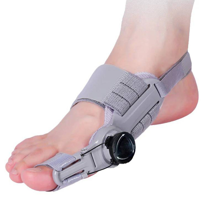 Unisex bunion corrector with toe spacer in beige silicone, featuring adjustable heel strap for foot pain relief and alignment