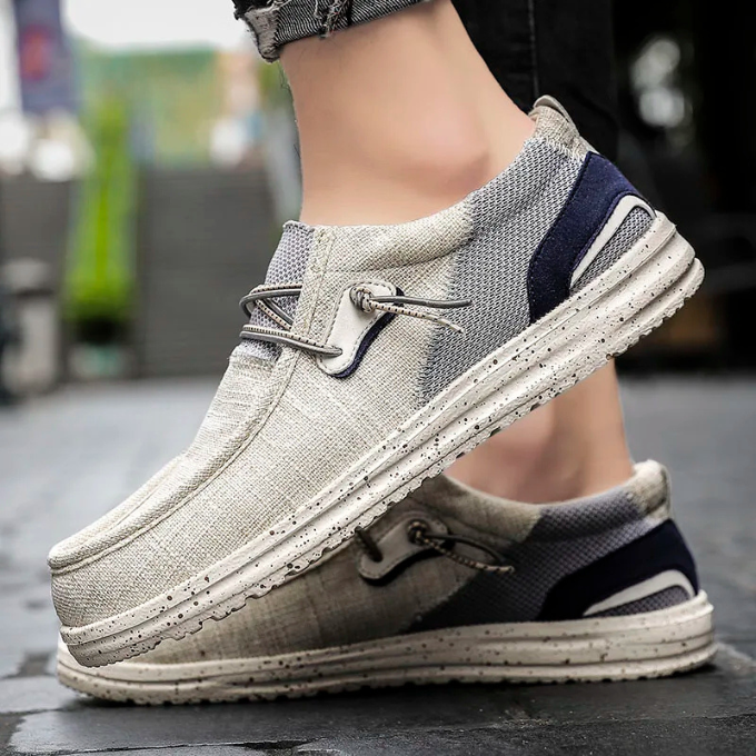 Light blue canvas slip-on casual shoes, comfortable and lightweight unisex footwear.