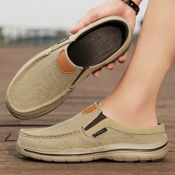 Back view of unisex canvas slip-on shoes, highlighting the structured design.