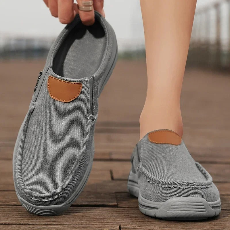 Relaxed fit canvas slip-on shoes, combining comfort and simple unisex design.