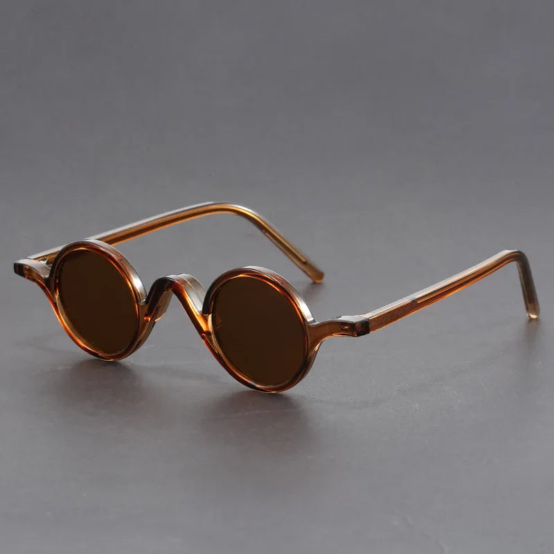 Close-up of Unisex Classic Asymmetric UV400 Sunglasses, highlighting unique frame and lens