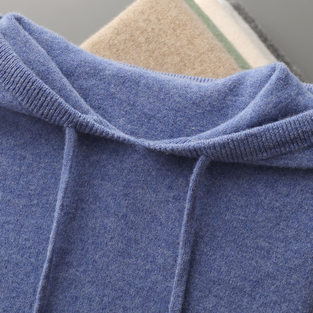 Unisex Classic Comfort Pullover Hoodie, close-up of ribbed cuffs and hem