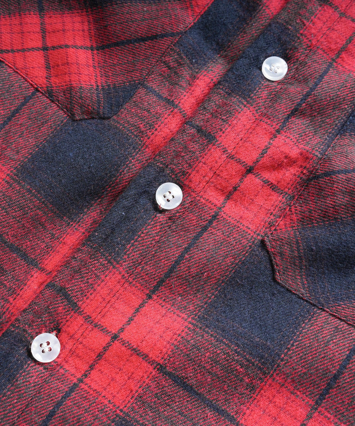 Classic and warm plaid flannel shirt jacket, an essential unisex wardrobe piece.