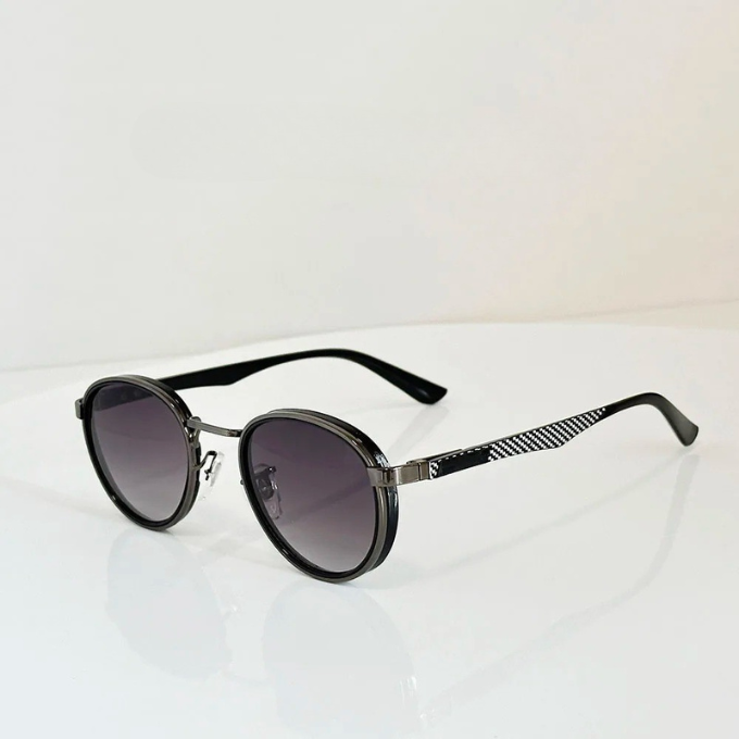 Retro-inspired round designer sunglasses, unisex, providing crucial UV eye protection