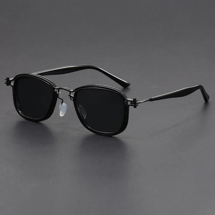 Close-up of black unisex square frame sunglasses, essential summer eyewear accessory