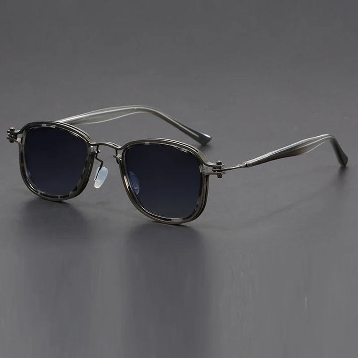 Unisex sunglasses with a classic square frame, offering reliable UV protection and comfort