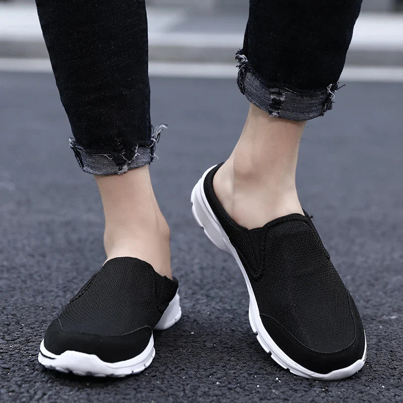 Pair of unisex laceless comfort shoes, showcasing their lightweight and flexible construction.