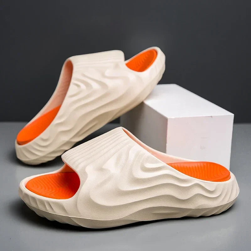 Pair of Cloud-Soft EVA comfort slides, designed for unisex wear with cushioning for house, pool, or summer.