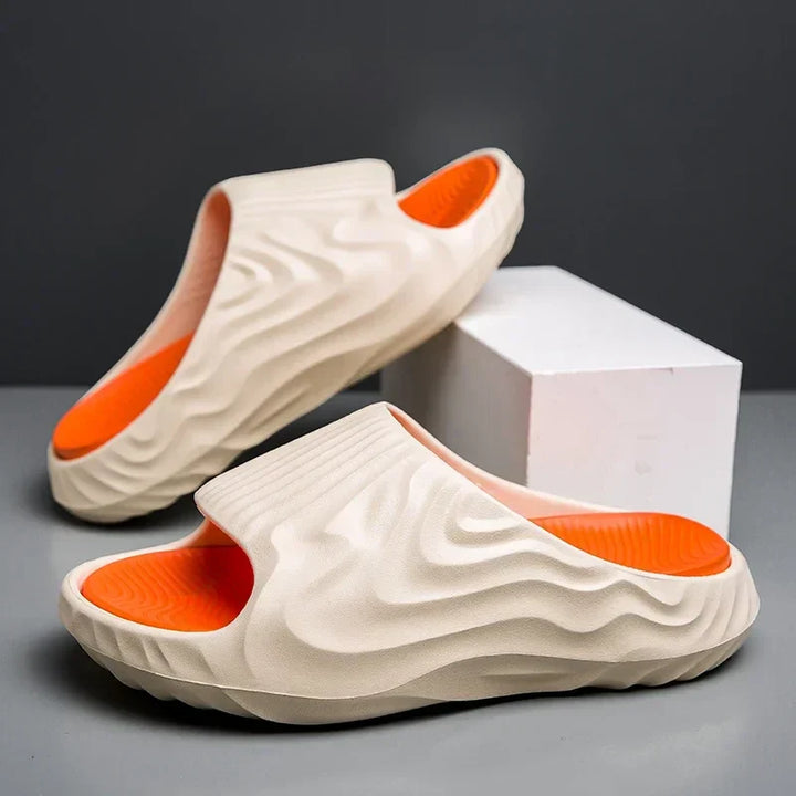 Pair of Cloud-Soft EVA comfort slides, designed for unisex wear with cushioning for house, pool, or summer.