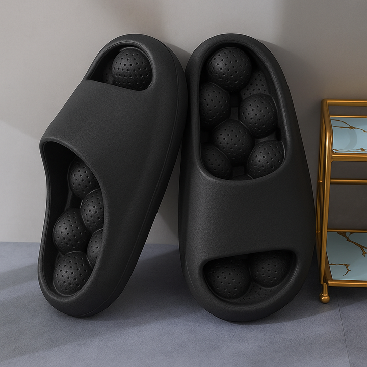 Close-up of the sole of Unisex Comfort Arch Support Slides, emphasizing the non-slip tread and cushioned design.
