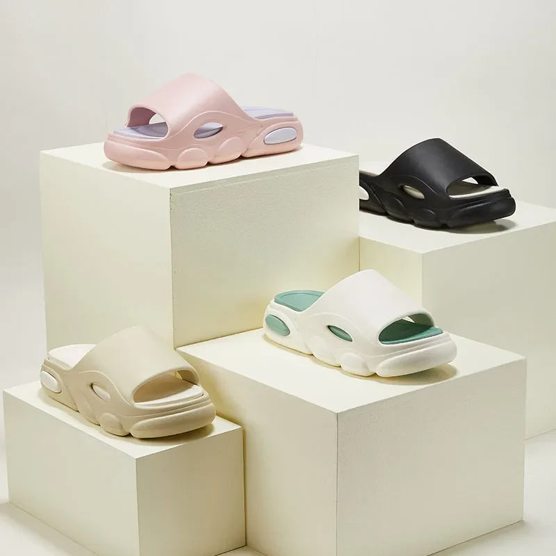 Pair of Unisex Comfort Cushioned Slides, perfect as house shoes or beach sandals.
