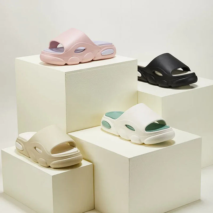 Pair of Unisex Comfort Cushioned Slides, perfect as house shoes or beach sandals.