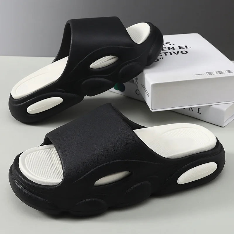 Model wearing Unisex Cushioned Footwear, demonstrating the relaxed fit and style of the sandals.