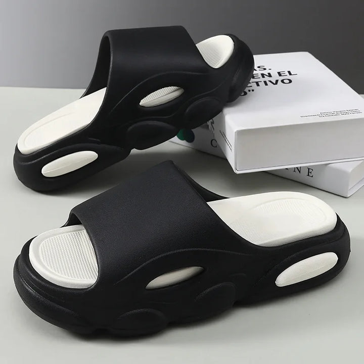 Model wearing Unisex Cushioned Footwear, demonstrating the relaxed fit and style of the sandals.