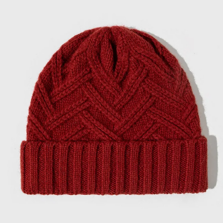 Unisex chevron knit beanie in an outdoor setting, demonstrating its warmth and style