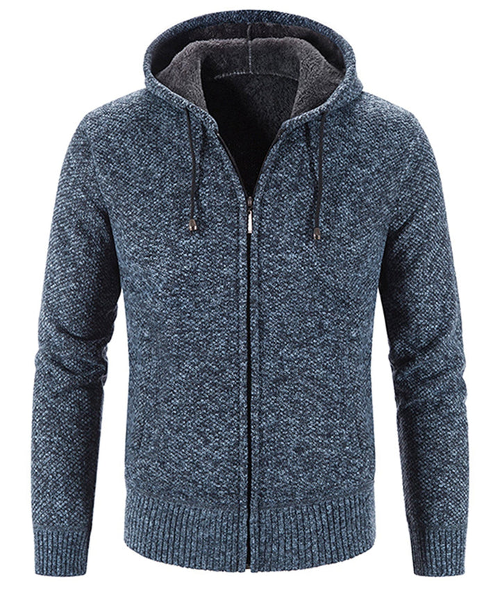 Model wearing a black cozy fleece zip-up hoodie, demonstrating its versatility as outerwear